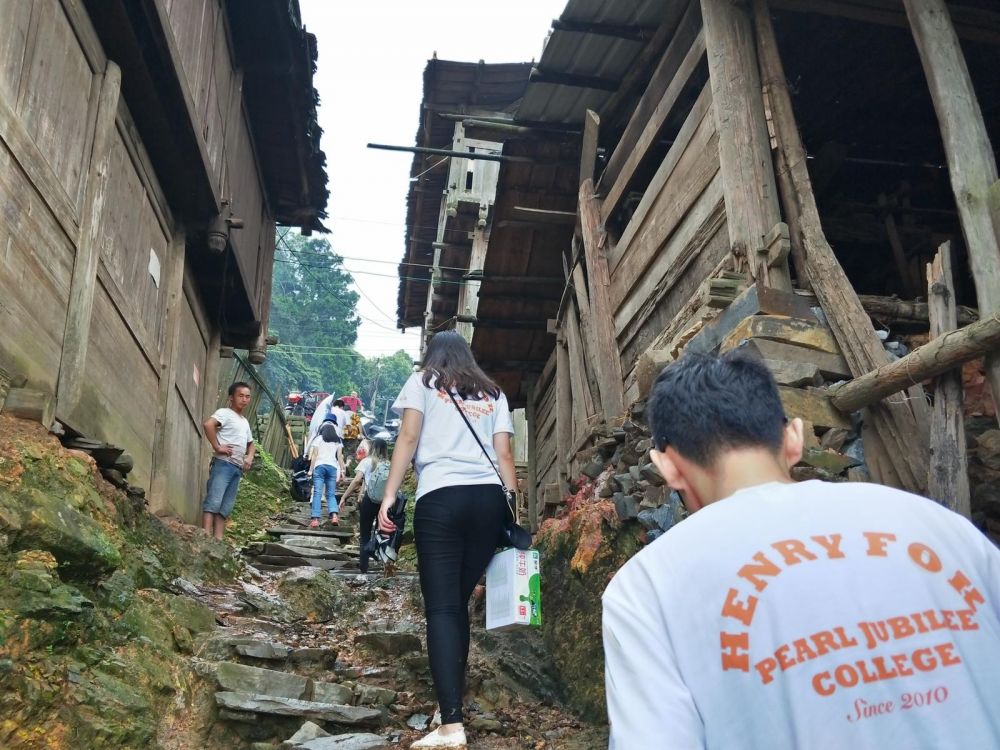 Distributing supplies - volunteers in Guizhou China